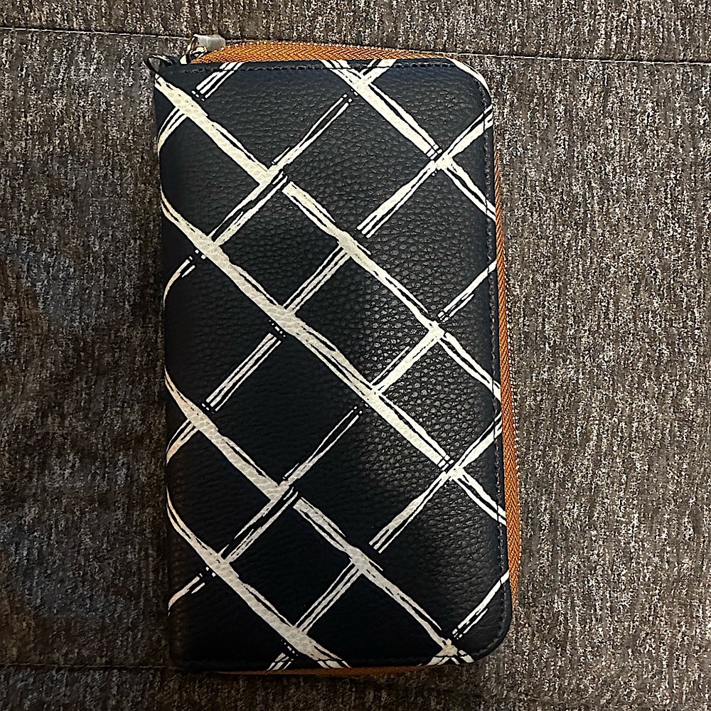 Thirty-one ‘All about the Benjamin’s” wallet.